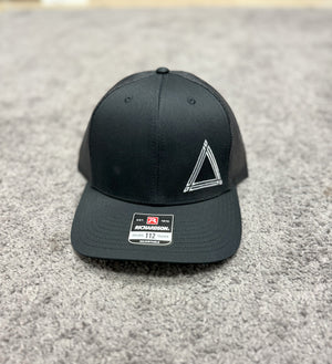 
            
                Load image into Gallery viewer, Black Stitch Logo Trucker Hat
            
        