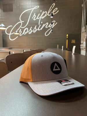 
            
                Load image into Gallery viewer, Grey &amp;amp; Gold Mesh Hat with Circle Patch
            
        